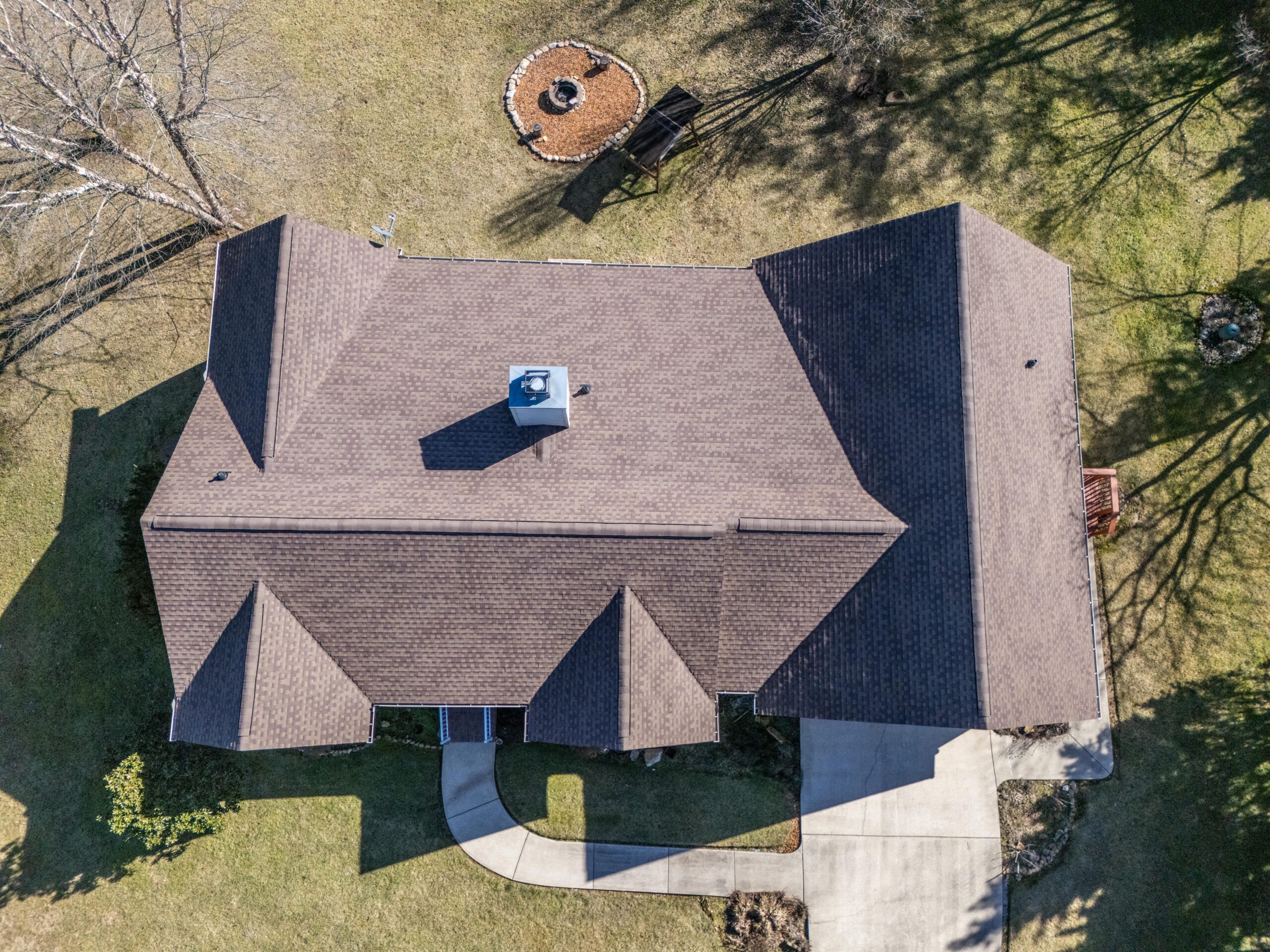 Drone view of an architectural shingle roofing system installed to GAF specifications in Tennessee