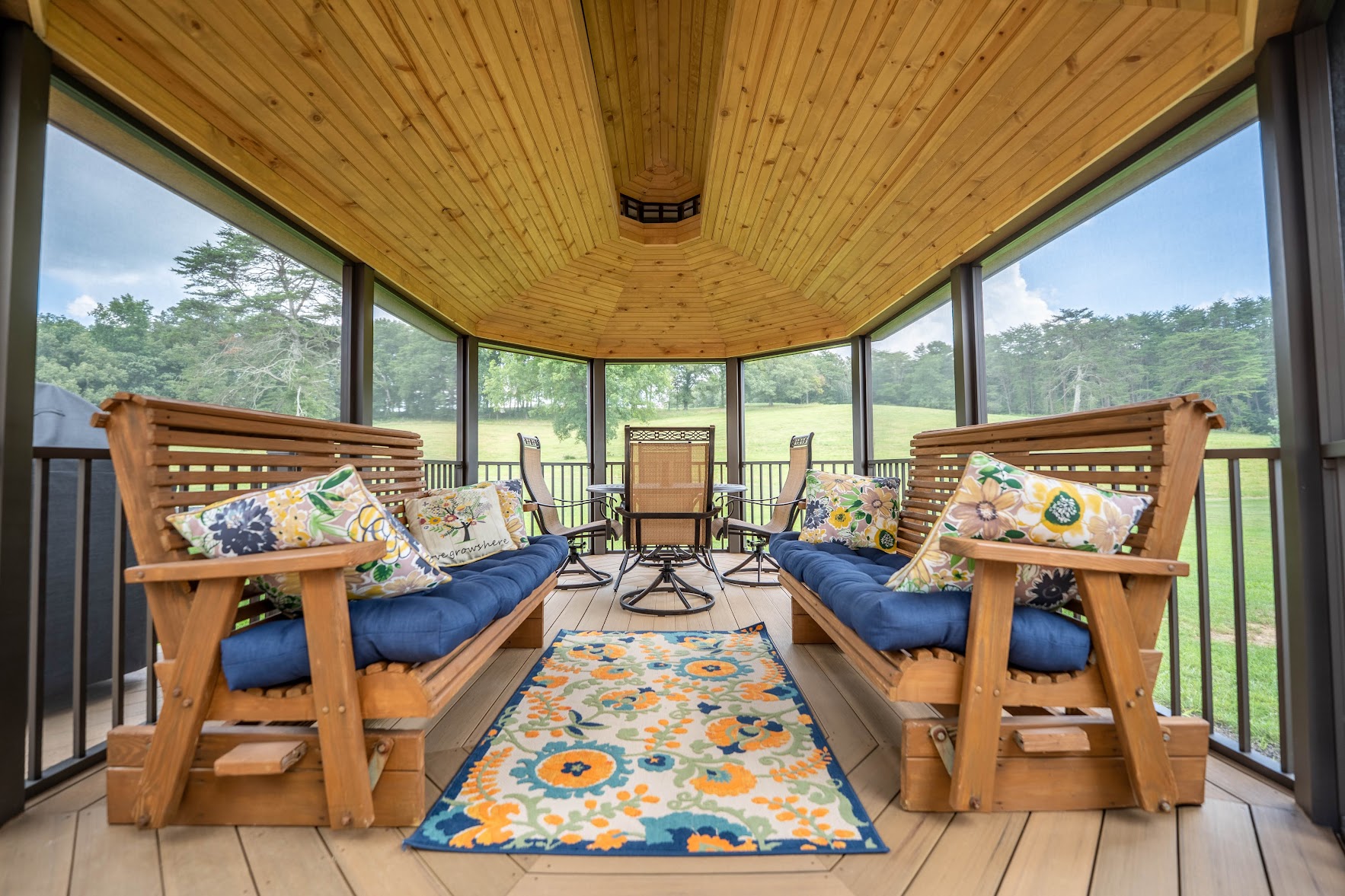 Custom outdoor wooden deck surrounded by trees in Fairfield Glade, TN