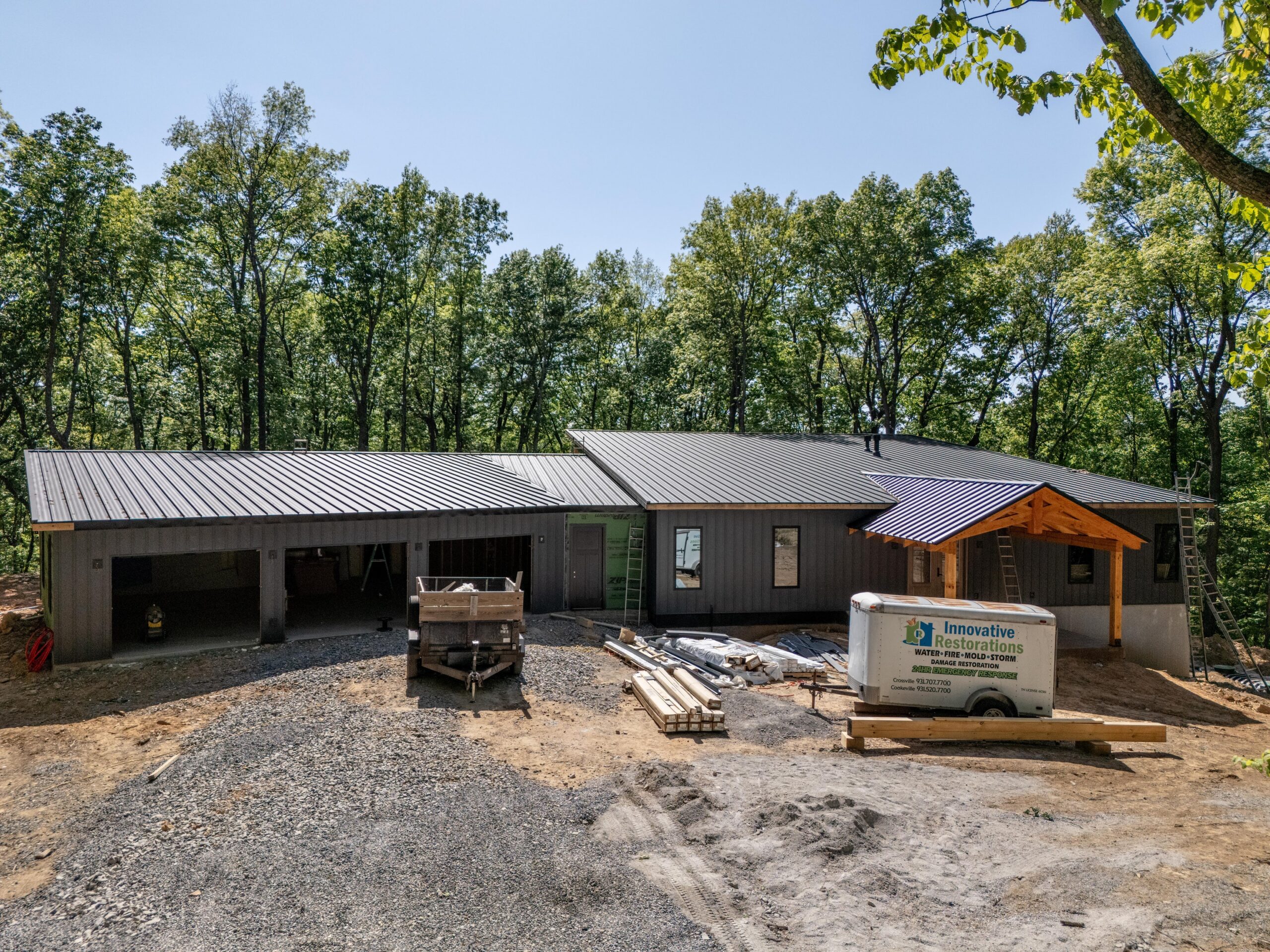 Standing seam metal roof with clean vertical panel lines installed by Jeff Woods Construction in Tennessee