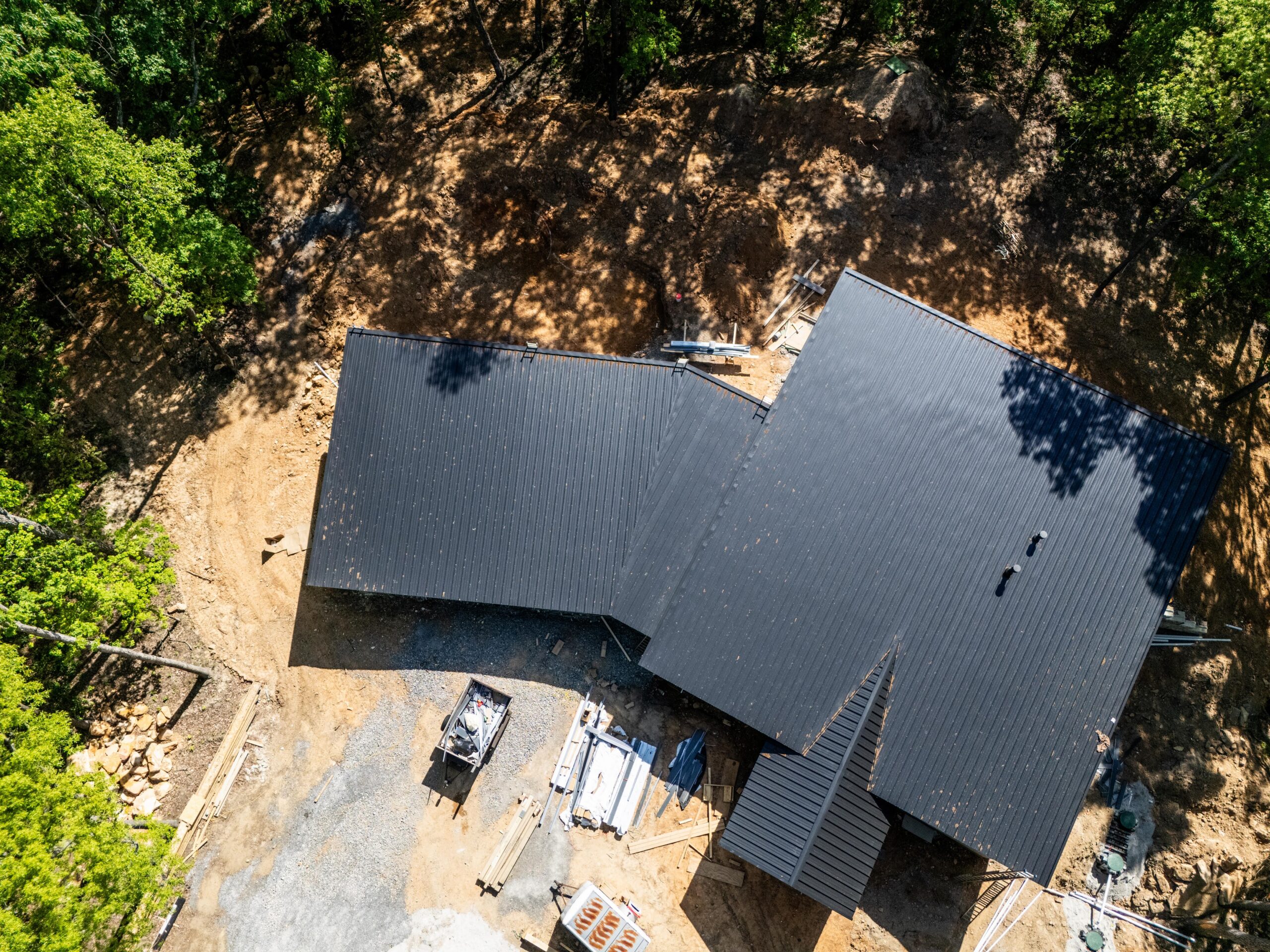 Aerial drone view of a standing seam metal roof installed by Jeff Woods Construction in Tennessee