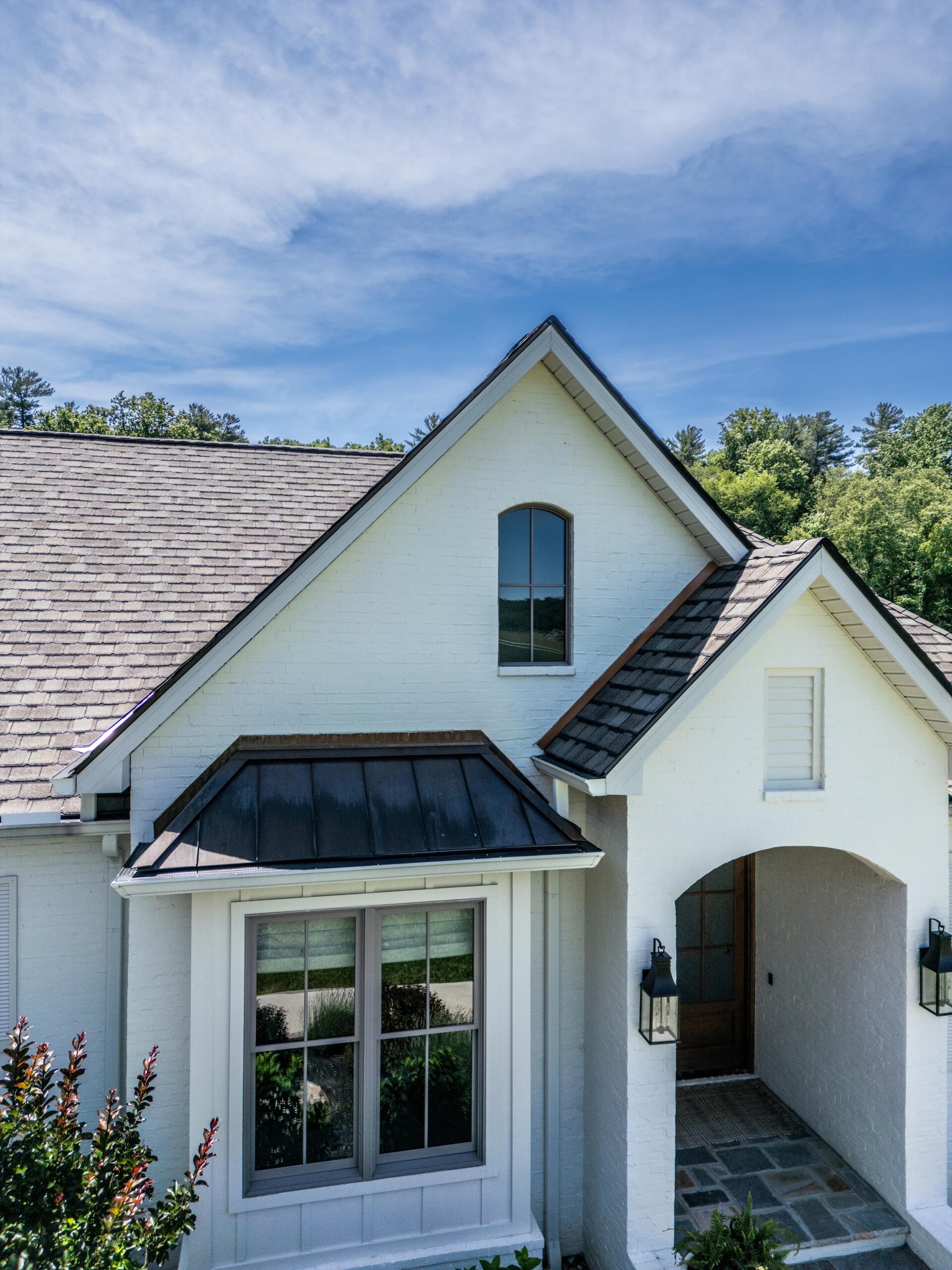 Drone view showing the dimensional profile of a designer shingle roof by Jeff Woods Construction in Tennessee