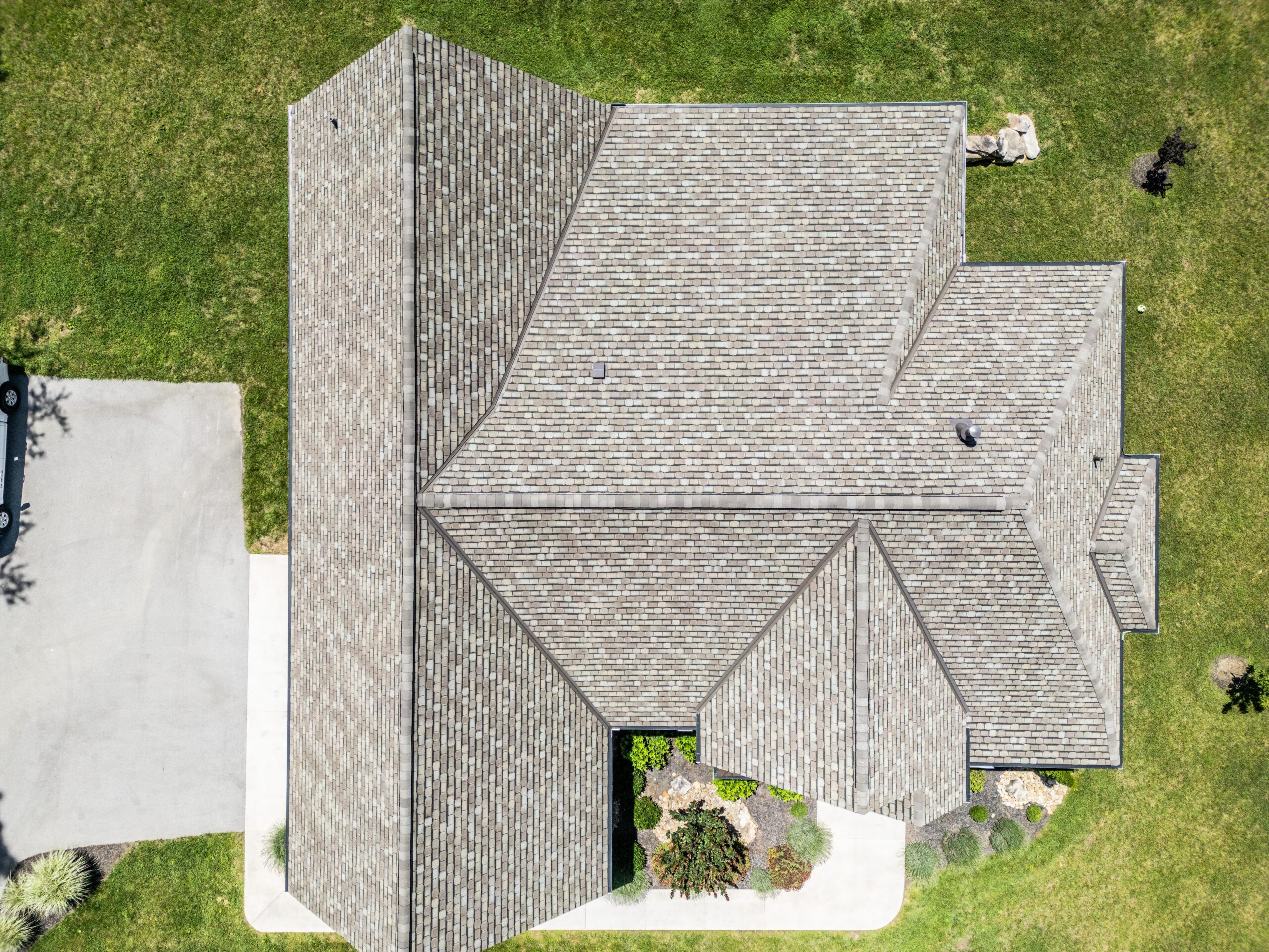 Aerial drone view of a designer shingle roof installed by Jeff Woods Construction in Middle Tennessee