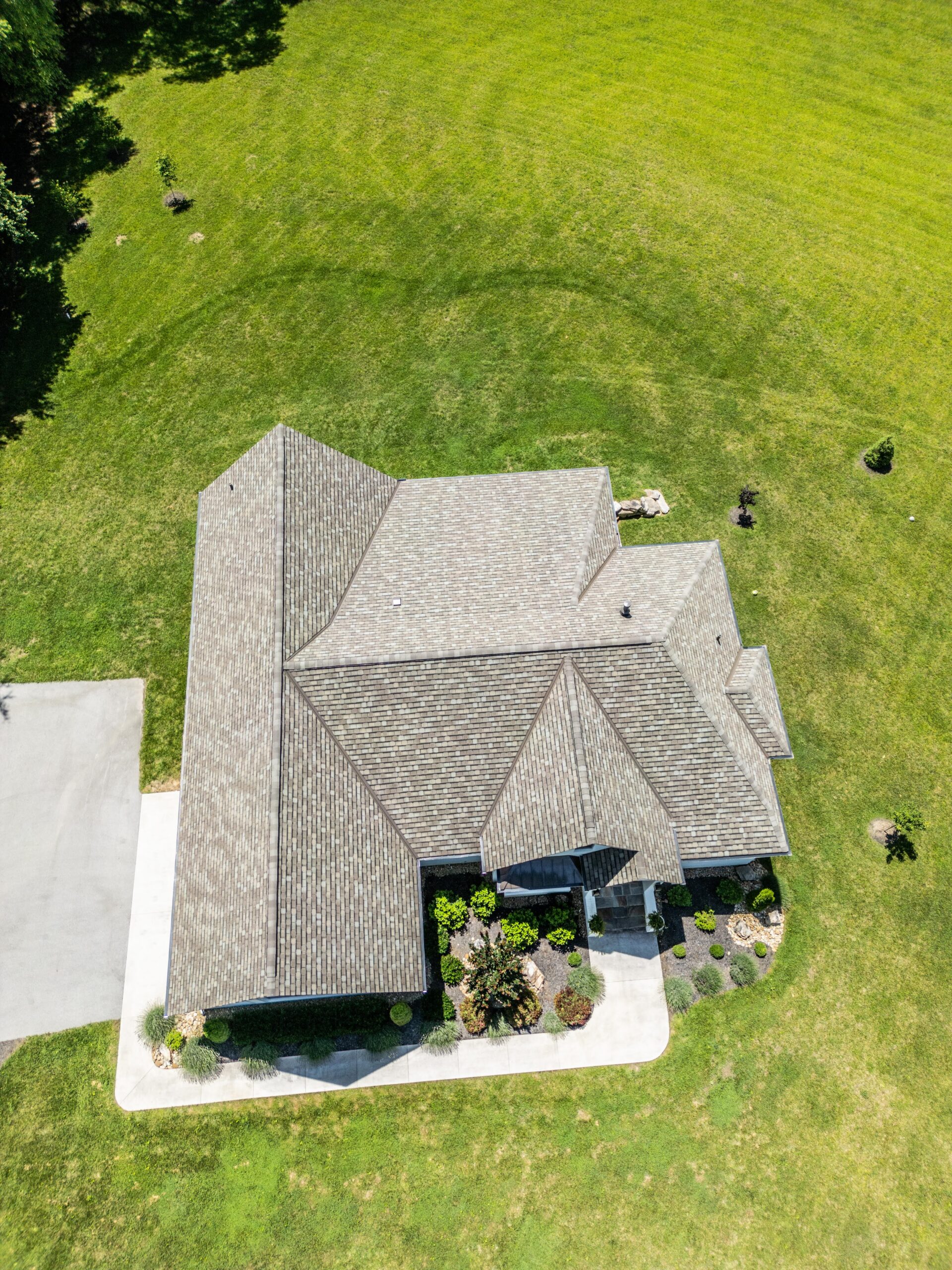 Completed designer shingle roof installation by Jeff Woods Construction seen from above
